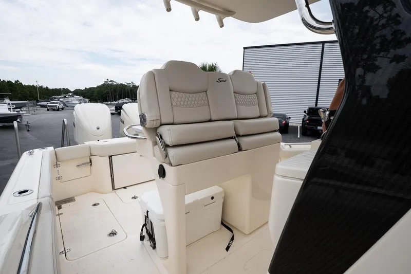 Slide: The Image of 2026 Scout 288 LXF boat interior with luxurious seating and modern design. - 47