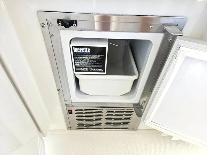 Slide: The Image of Built-in ice maker on a 2004 Carver 560 Voyager PH yacht. - 29