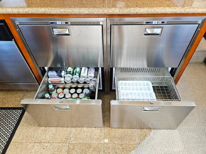 Slide: The Image of Stainless steel drawer refrigerators on a 2004 Carver 560 Voyager PH yacht, stocked with beverages and ice. - 11