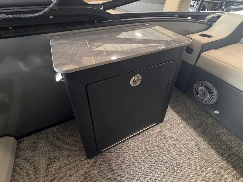 Slide: The Image of The interior of the Barletta Cabrio 24 UE features a sleek cabinet with a marble top. - 20
