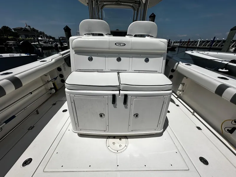 Slide: The Image of 2007 Robalo R300 Center Console boat interior with seating and storage compartments. - 18