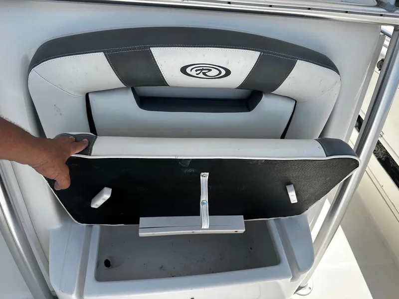 Slide: The Image of 2007 Robalo R300 Center Console seat with foldable backrest and logo detail. - 9