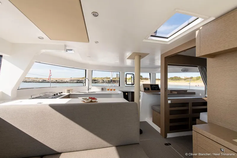 Slide: The Image of Modern interior of 2025 NEEL 47 yacht with panoramic windows and sleek design. - 11