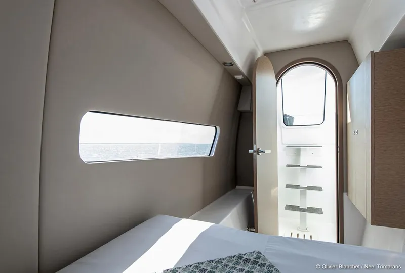 Slide: The Image of Interior of 2025 NEEL 47 yacht cabin with modern design and ocean view. - 18