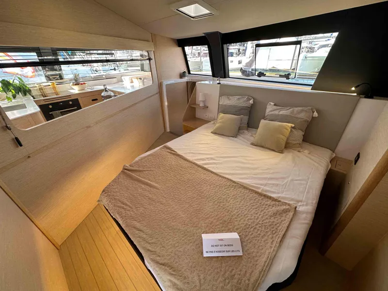 Slide: The Image of Luxurious bedroom interior of 2025 NEEL 52 yacht with modern design and cozy bedding. - 10