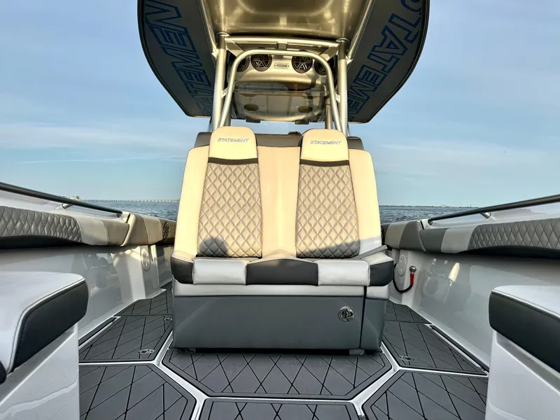 Slide: The Image of Luxury seating on 2019 Statement 350 Open boat, featuring diamond-stitched upholstery and sleek design. - 13
