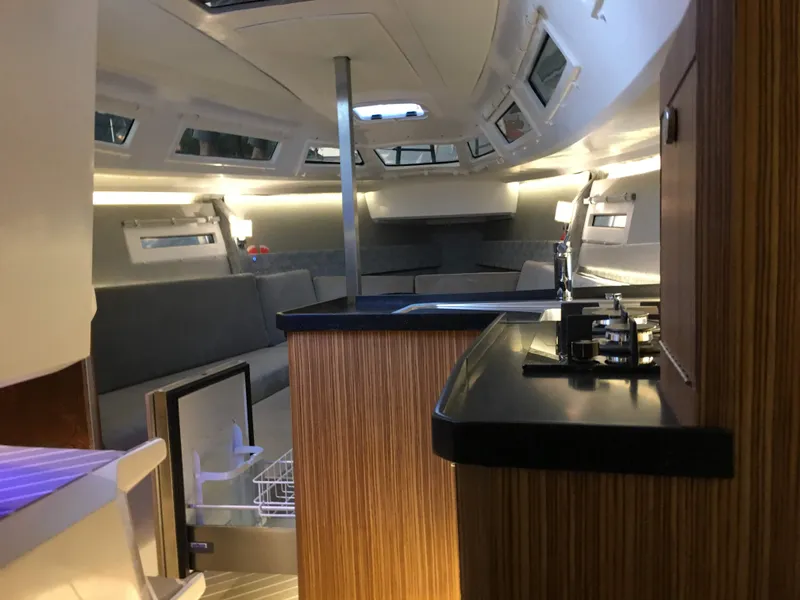 Slide: The Image of Luxurious interior of 2025 Faro Yachts 29, featuring modern design and comfortable seating. - 12
