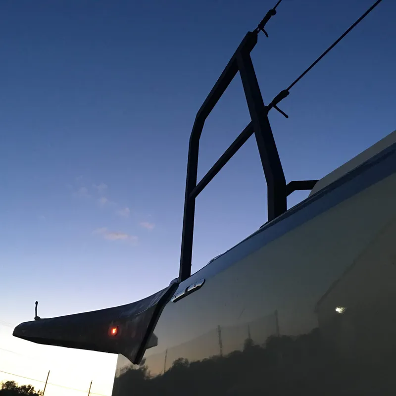 Slide: The Image of Faro Yachts 29, 2025 model, bow view at sunset with clear sky. - 31