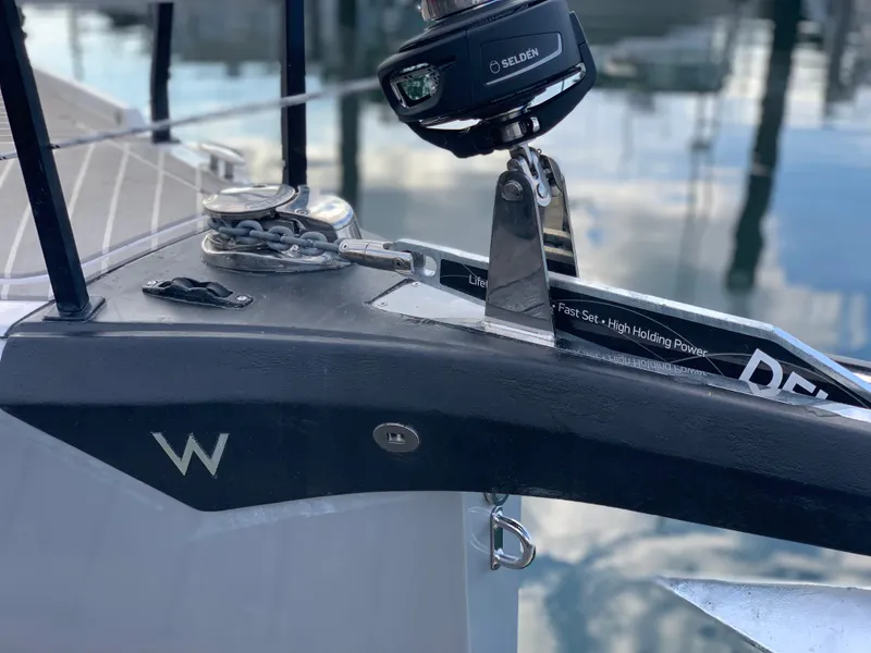 Slide: The Image of Bow of 2025 Faro Yachts 29 with anchor and chain mechanism. - 34