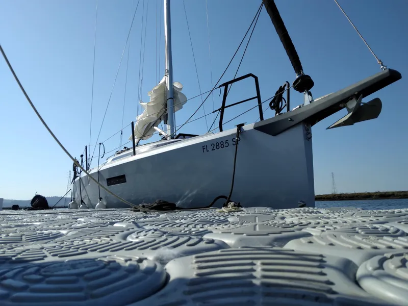 Slide: The Image of 2025 Faro Yachts 29 sailboat docked on a sunny day. - 5