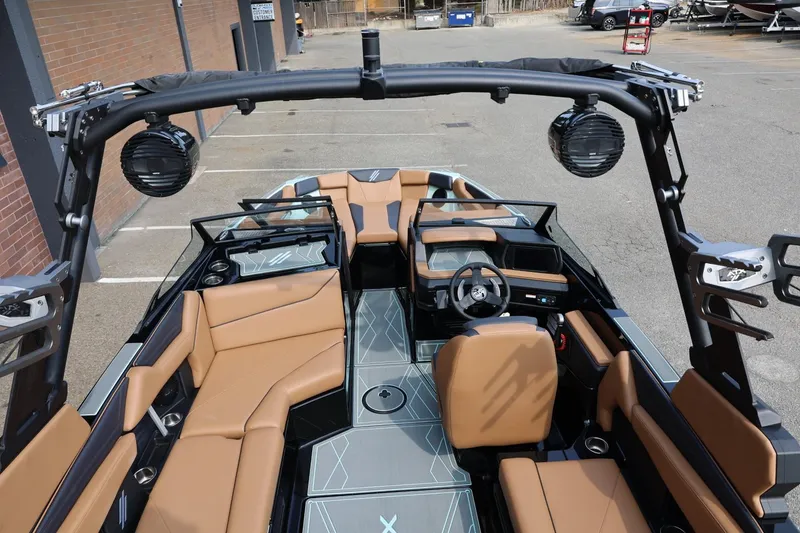 Slide: The Image of 2026 ATX Surf Boats 22 Type-S interior with tan seating and modern design. - 18