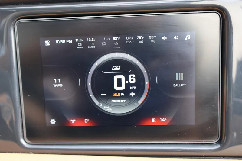 Slide: The Image of ATX Surf Boats 2026 22 Type-S dashboard display showing speed, ballast, and system indicators. - 25