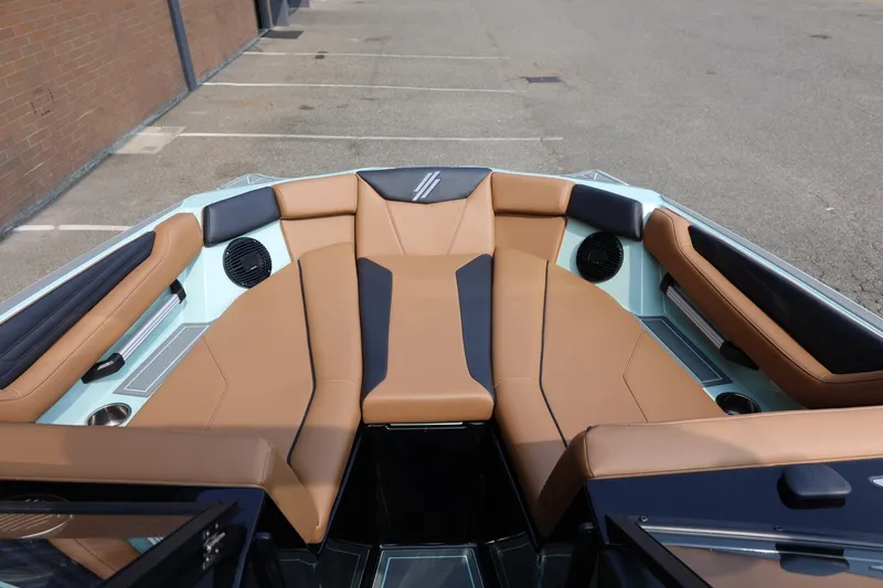 Slide: The Image of Interior of 2026 ATX Surf Boats 22 Type-S with tan and black seating. - 30