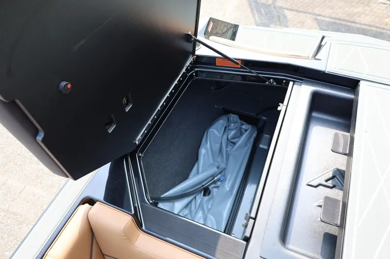 Slide: The Image of Open storage compartment in 2026 ATX Surf Boats 22 Type-S, featuring spacious interior. - 38