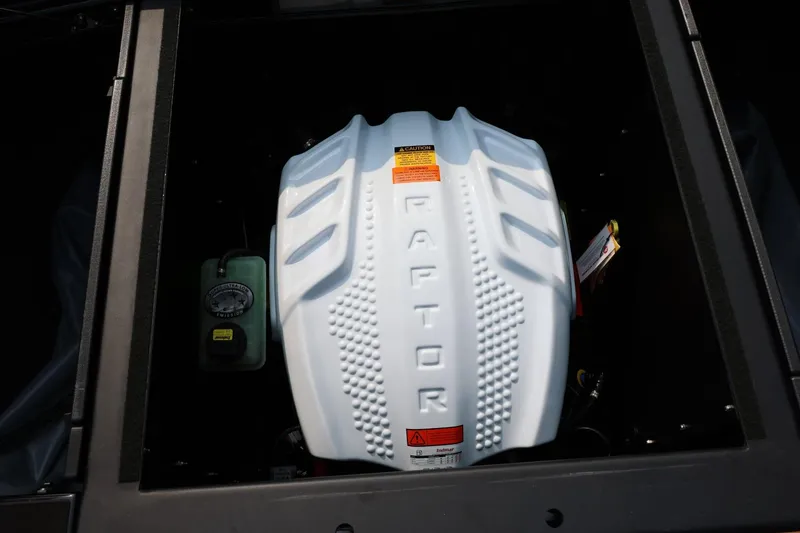 Slide: The Image of 2026 ATX Surf Boats 22 Type-S engine compartment with Raptor engine cover. - 40