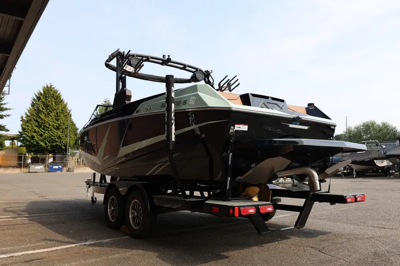 Slide: The Image of 2026 ATX Surf Boats 22 Type-S on trailer, parked outdoors. - 8