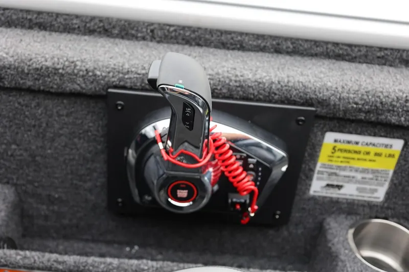 Slide: The Image of Throttle control of 2026 Lund 2075 Pro-V Bass XS boat with safety lanyard. - 26