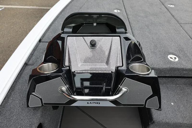 Slide: The Image of 2026 Lund 2075 Pro-V Bass XS boat console with cup holders and sleek design. - 30