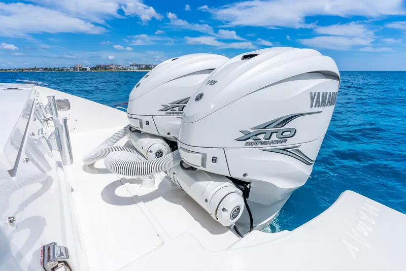 Slide: The Image of 2024 Pursuit S 358 Sport boat with Yamaha XTO Offshore engines on blue ocean. - 38