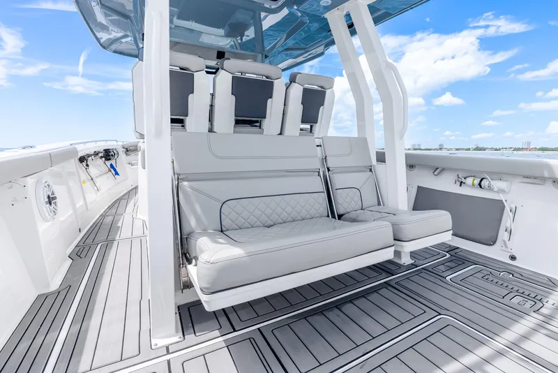 Slide: The Image of 2024 Pursuit S 358 Sport boat interior with luxurious seating and sleek design. - 45