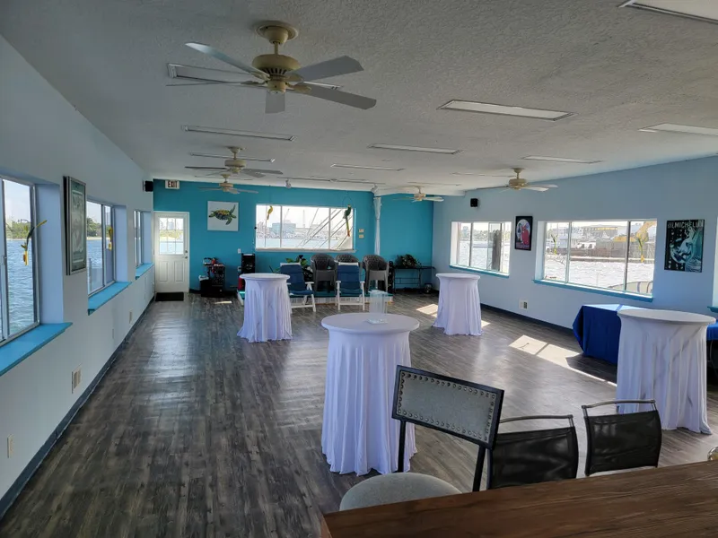 Slide: The Image of Spacious interior of a 2003 custom floating home with elegant decor and waterfront views. - 34