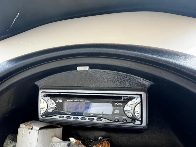 Slide: The Image of JVC stereo system in a 2003 Yamaha Boats 210LX dashboard. - 8