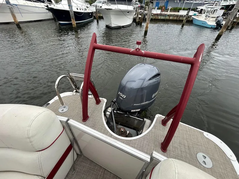 Slide: The Image of Pontoon boat with Yamaha outboard motor docked at marina, South Bay 500RS, 2017 model. - 14