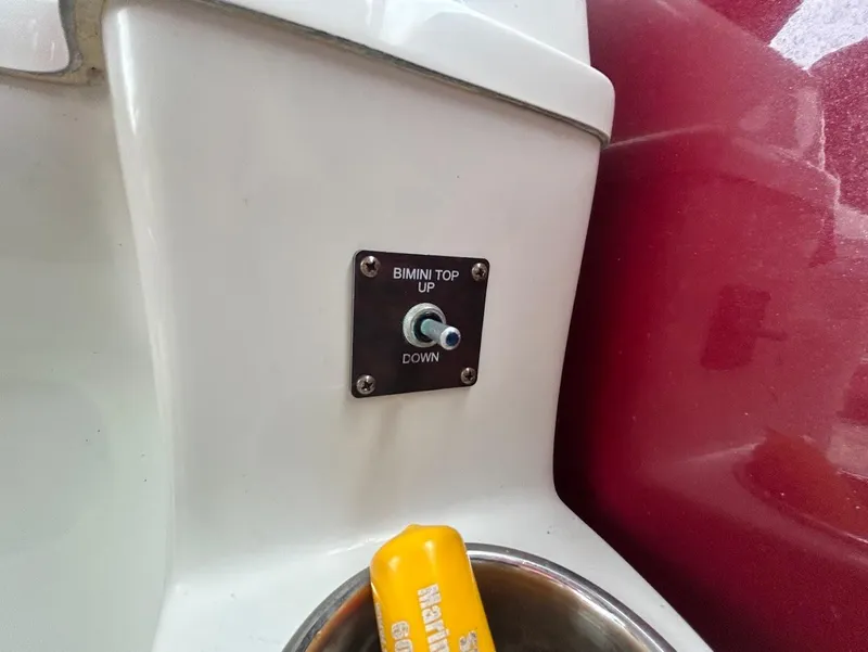 Slide: The Image of Bimini top control switch on 2017 South Bay 500RS boat. - 17