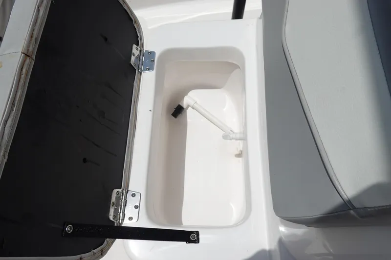 Slide: The Image of Open storage compartment on 2022 Key Largo 1800 Center Console boat. - 20