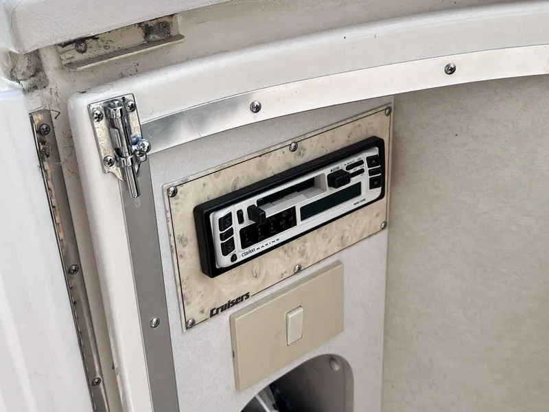 Slide: The Image of 1998 Cruisers Yachts 3075 Rogue interior with Clarion marine stereo system. - 14