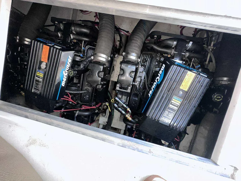 Slide: The Image of Engine compartment of a 1998 Cruisers Yachts 3075 Rogue with twin MerCruiser engines. - 20