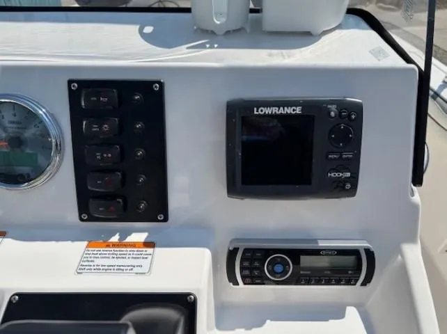 Slide: The Image of Control panel of 2017 Yamaha Boats 190 FSH Deluxe with Lowrance display and gauges. - 21