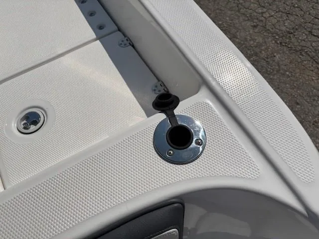 Slide: The Image of 2017 Yamaha Boats 190 FSH Deluxe deck detail with open fuel cap. - 31