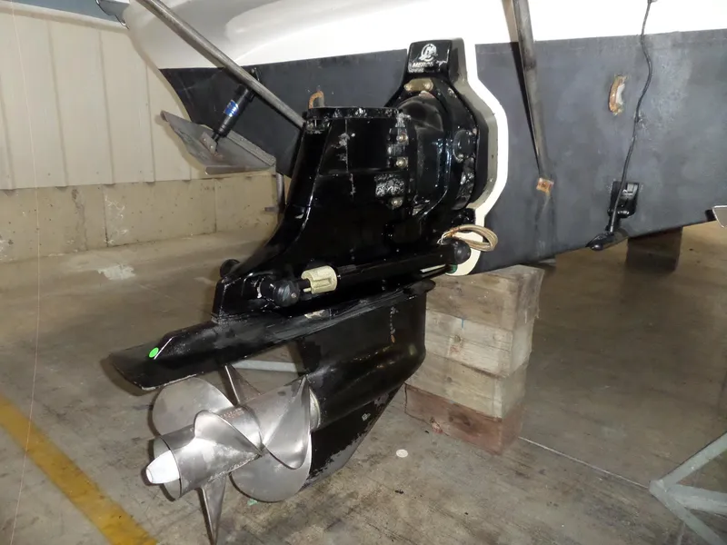 Slide: The Image of 2006 Maxum 2400 SR3 boat stern drive and propeller in a garage. - 3
