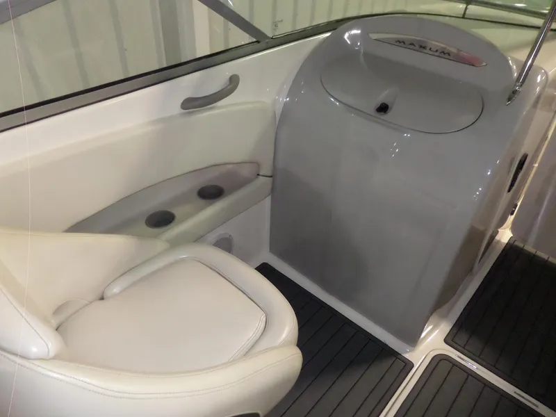 Slide: The Image of Interior of 2006 Maxum 2400 SR3 boat with seating and storage. - 39