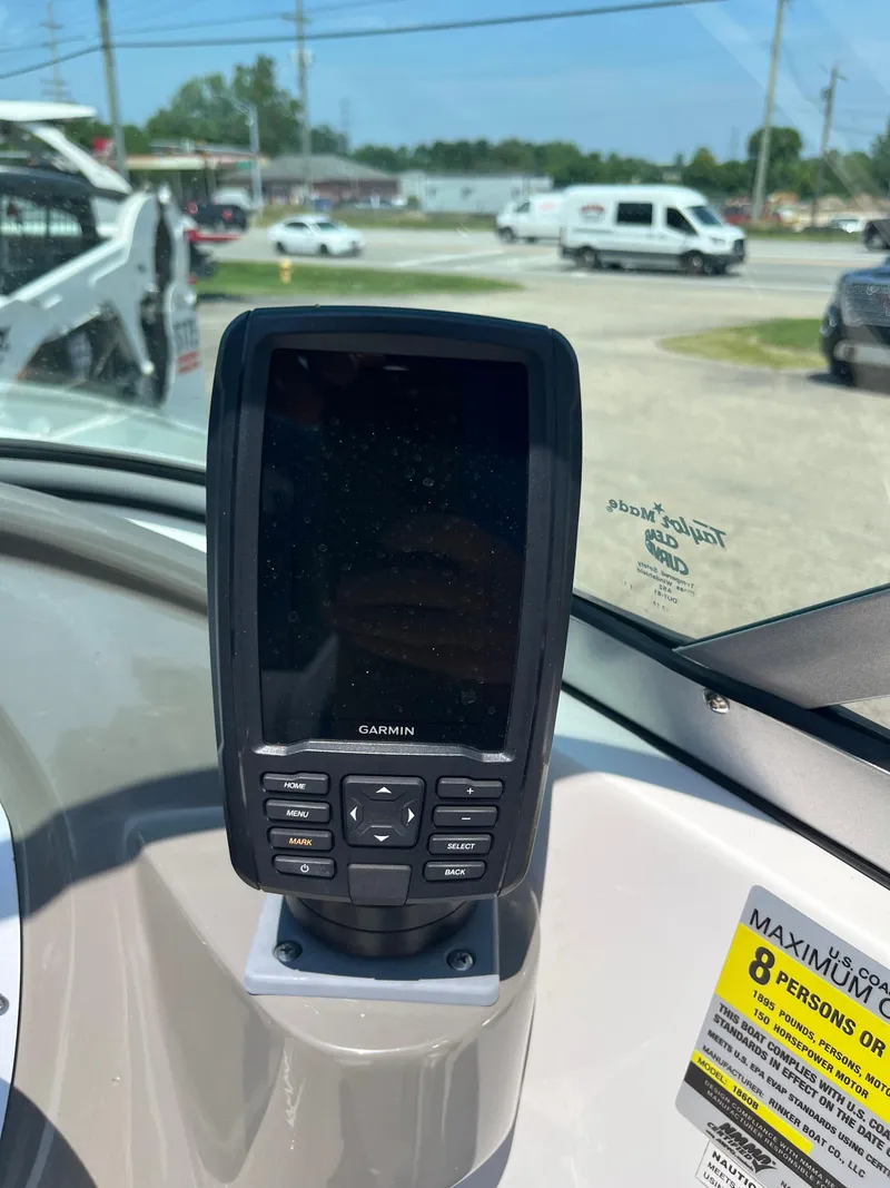Slide: The Image of Garmin device on 2013 Rinker Captiva 186 BR FS OB boat dashboard, outdoor setting. - 13