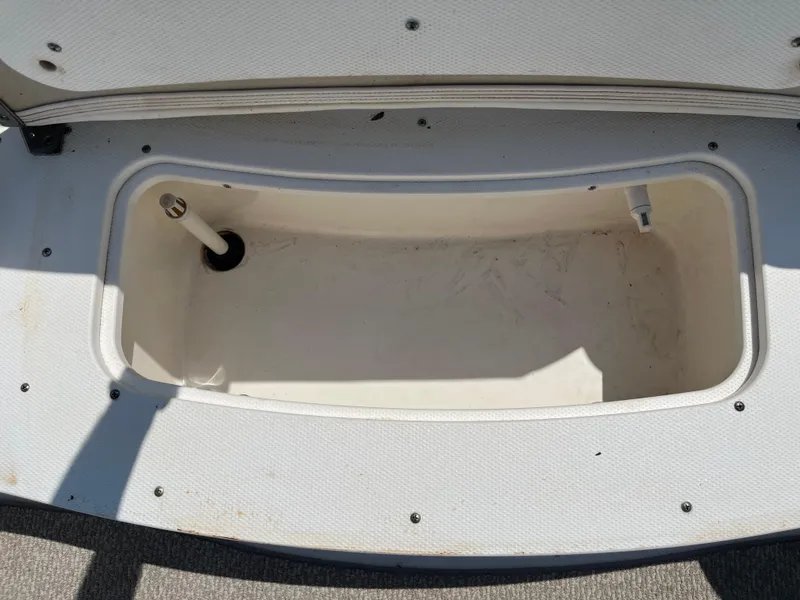 Slide: The Image of Storage compartment of 2013 Rinker Captiva 186 BR FS OB boat, open and empty. - 4