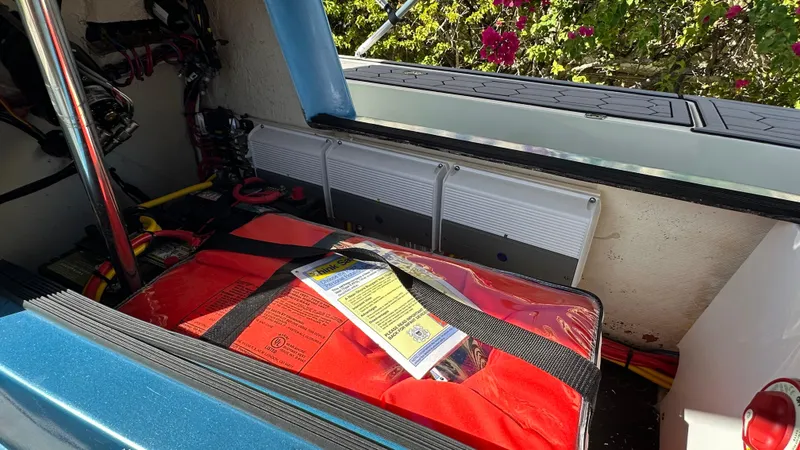Slide: The Image of Interior of a 2018 Outlaw 300R boat showing safety equipment and wiring. - 8