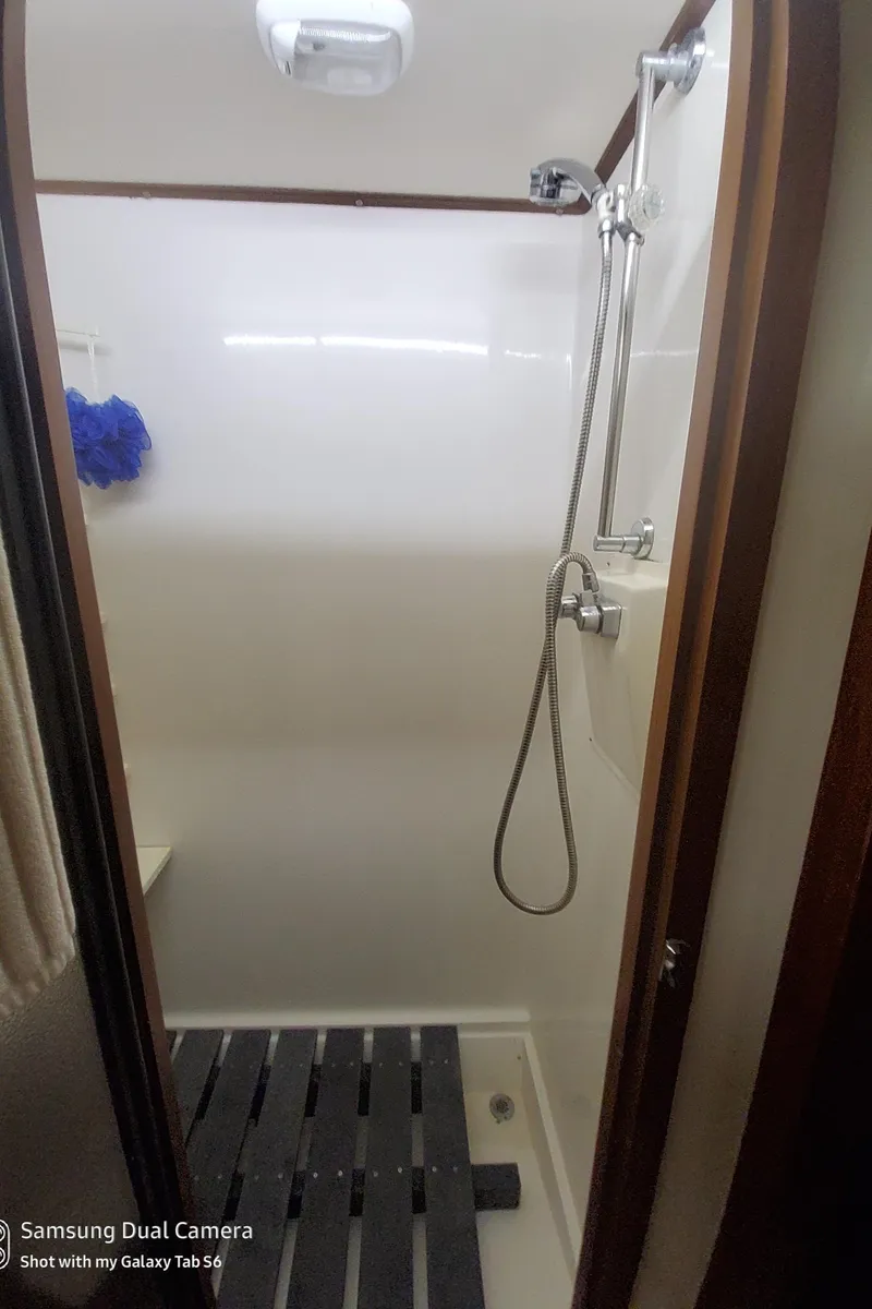 Slide: The Image of Shower area in 1989 DeFever 57 POC Motor Yacht with handheld showerhead. - 20