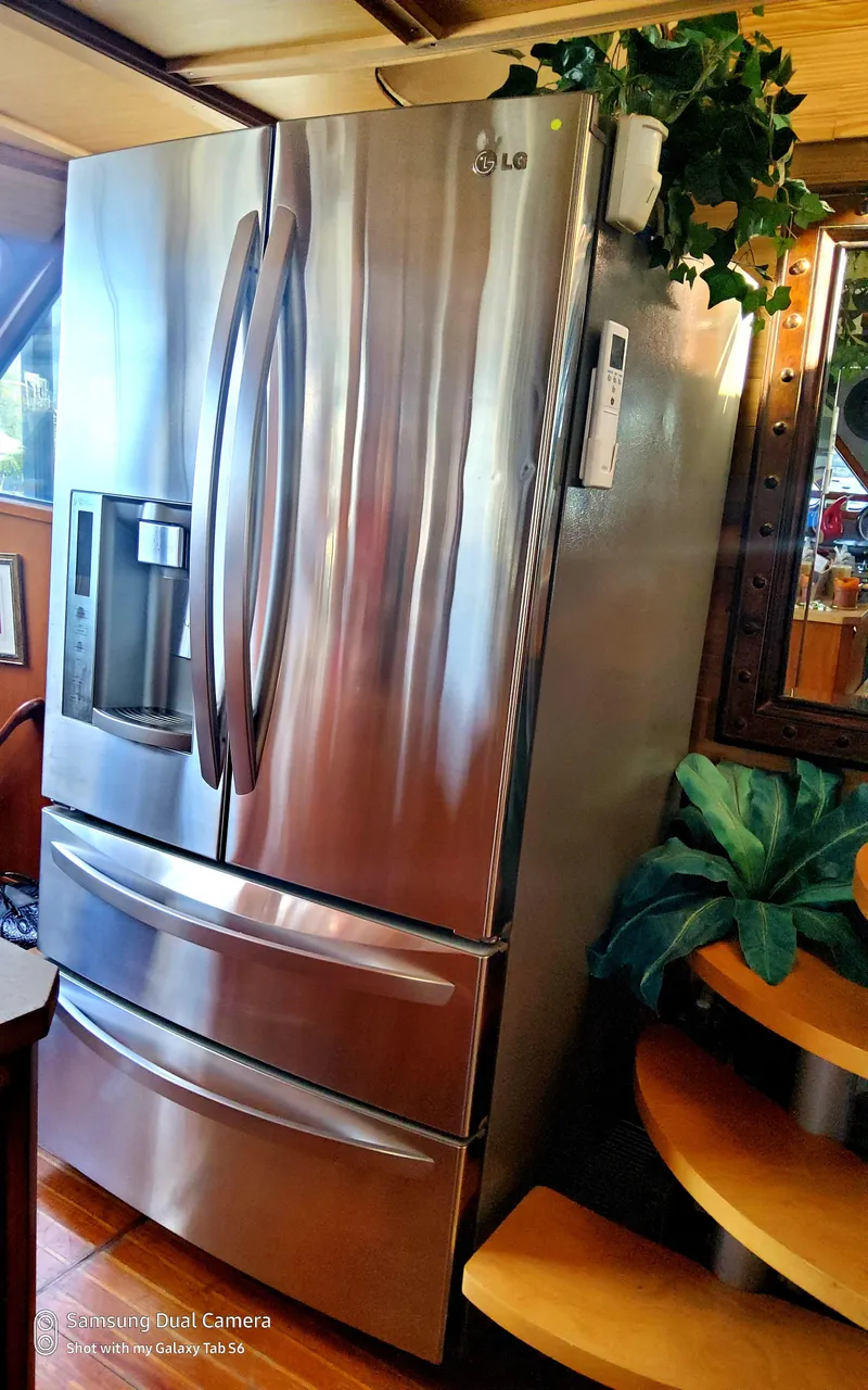 Slide: The Image of Stainless steel LG refrigerator inside 1989 DeFever 57 POC Motor Yacht. - 26