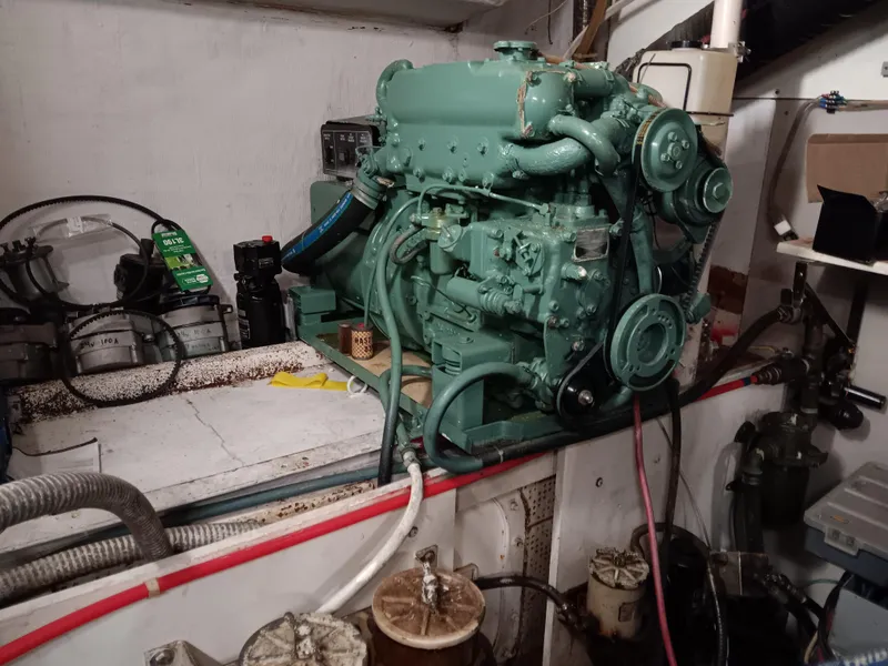 Slide: The Image of Engine room of 1989 DeFever 57 POC Motor Yacht with visible machinery and components. - 34