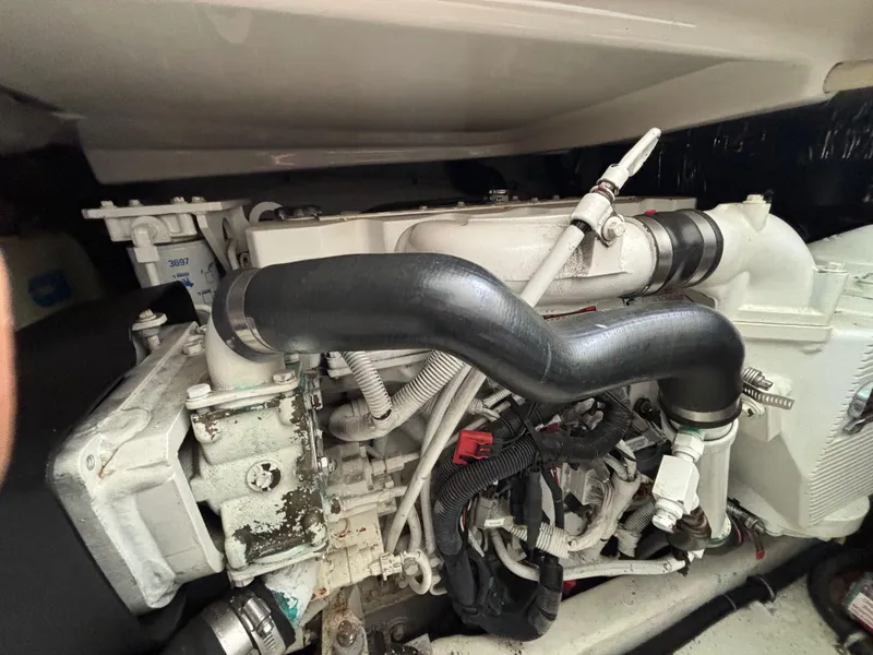 Slide: The Image of Engine compartment of a 2008 Tiara Yachts 3600 Open, showcasing detailed mechanical components. - 17