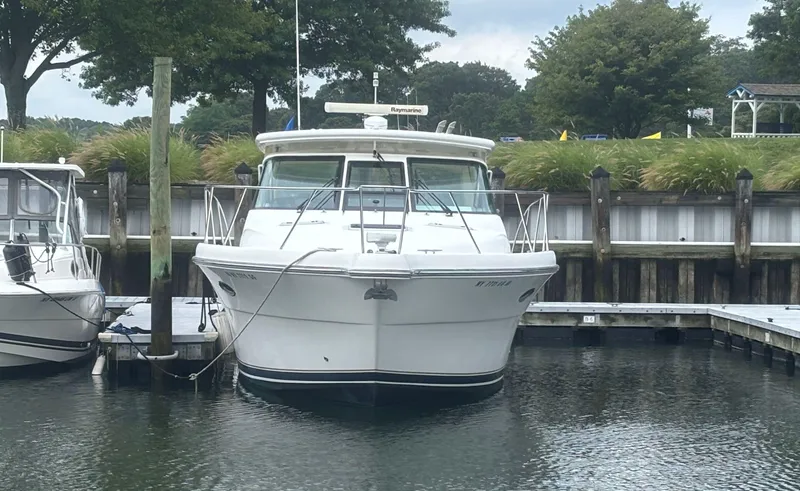 Slide: The Image of 2008 Tiara Yachts 3600 Open docked at marina, front view. - 3
