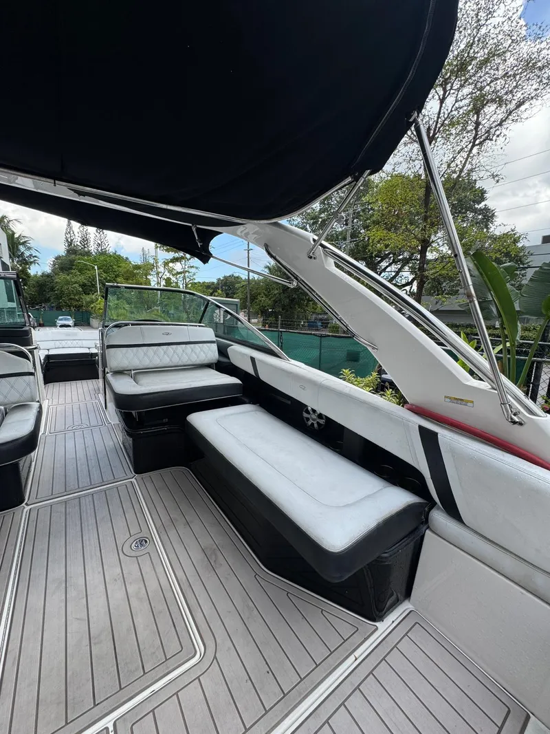 Slide: The Image of 2018 Regal 29 OBX boat interior with spacious seating and sleek design. - 15