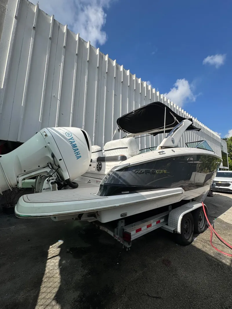 Slide: The Image of 2018 Regal 29 OBX boat on trailer with Yamaha outboard motor. - 8