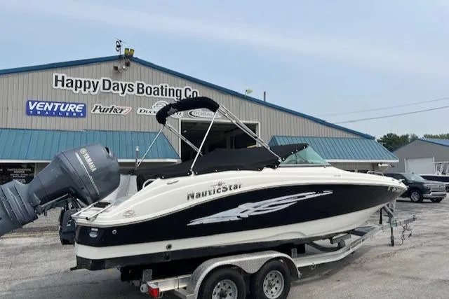 Slide: The Image of 2014 NauticStar 223DC Sport Deck boat on trailer at Happy Days Boating Co. - 4