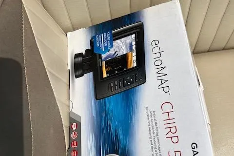 Slide: The Image of Garmin echoMAP CHIRP 54cv box on NauticStar 223DC Sport Deck, 2014 model. - 7