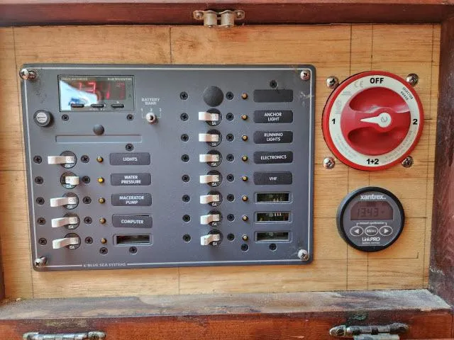 Slide: The Image of Electrical control panel on a 1978 Hardin Voyager 44 sailboat. - 38