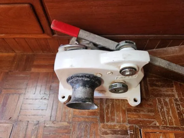 Slide: The Image of Vintage Hardin Voyager 44 winch mechanism on wooden floor, 1978 model. - 44