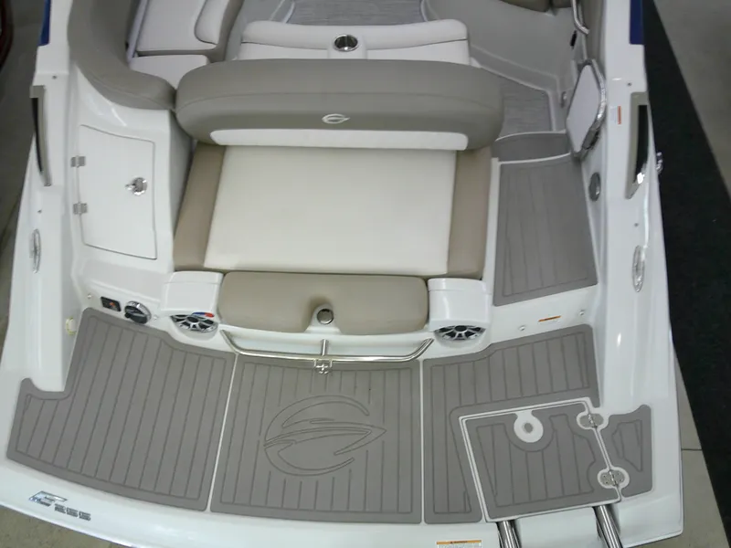 Slide: The Image of 2019 Crownline Eclipse E255 boat interior with cushioned seating. - 14